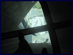 Views from CN Tower 46 1 - Glass floor, looking down the tower towards the aquarium